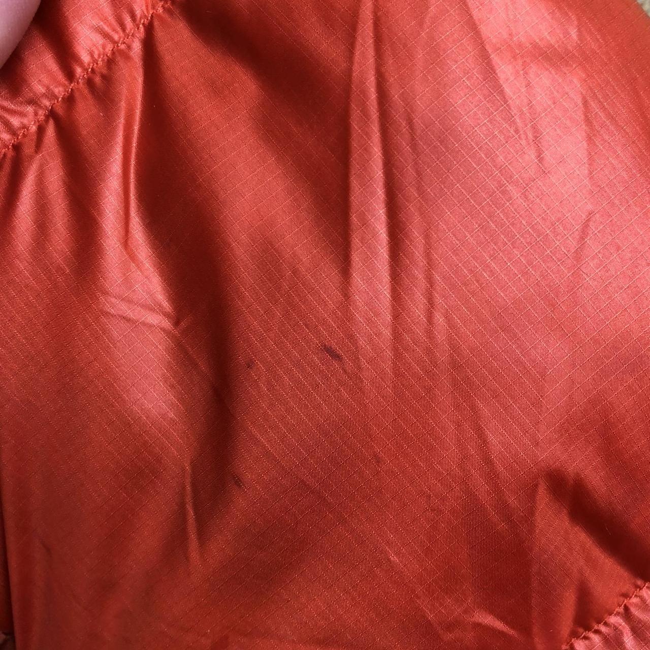 Orange two tone montbell puffer